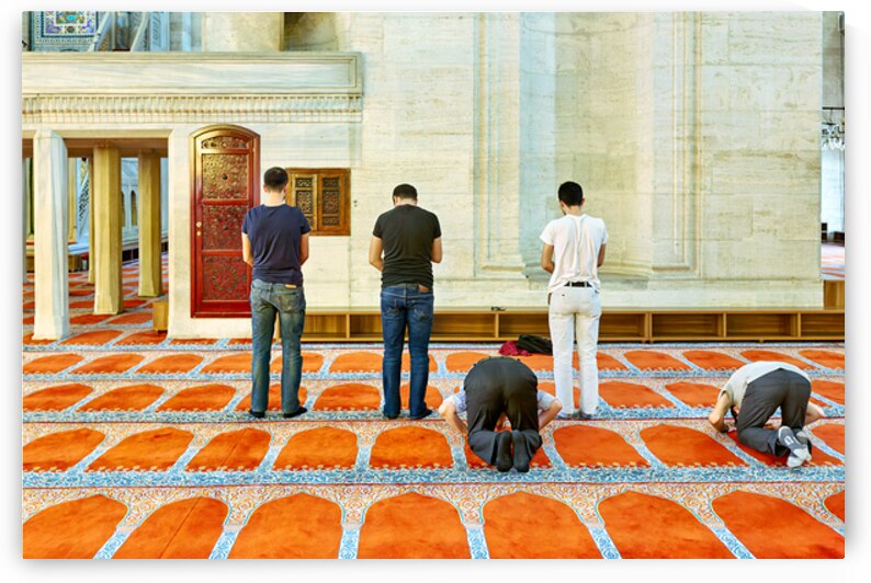 People pray inside Suleymaniye Mosque in Istanbul Turkey by Marco Brivio