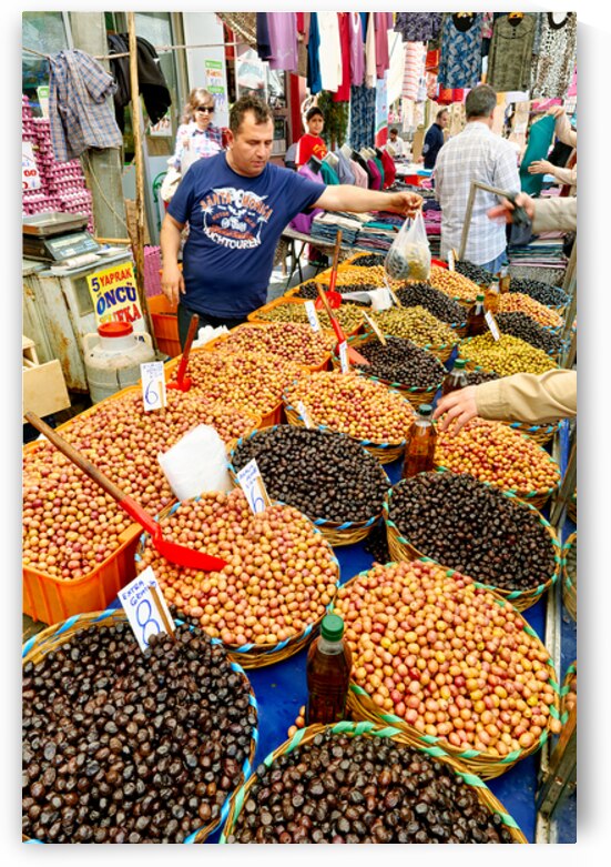 Street market in Istanbul with vendors and various goods by Marco Brivio