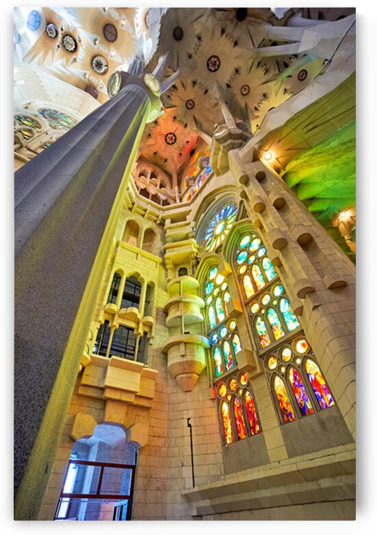 View of colorful windows inside Basílica de la Sagrada Família by Marco Brivio