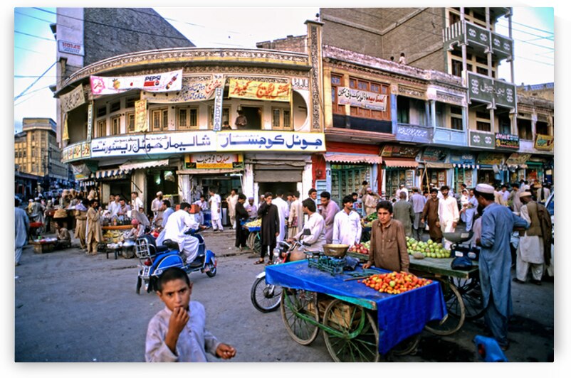 Busy market scene in Peshawar Pakistan during the day by Marco Brivio
