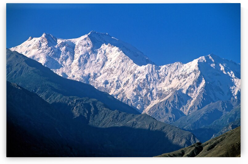 Snow covered peaks in the Karakoram range of Pakistan by Marco Brivio