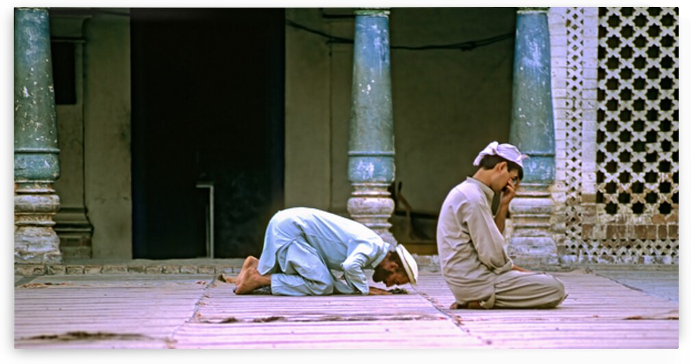 Men pray in the mosque in Chitral during afternoon prayer by Marco Brivio