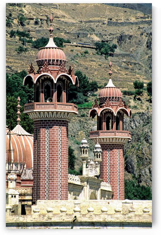 Mosque towers stand tall in Chitral Pakistan on a clear day by Marco Brivio