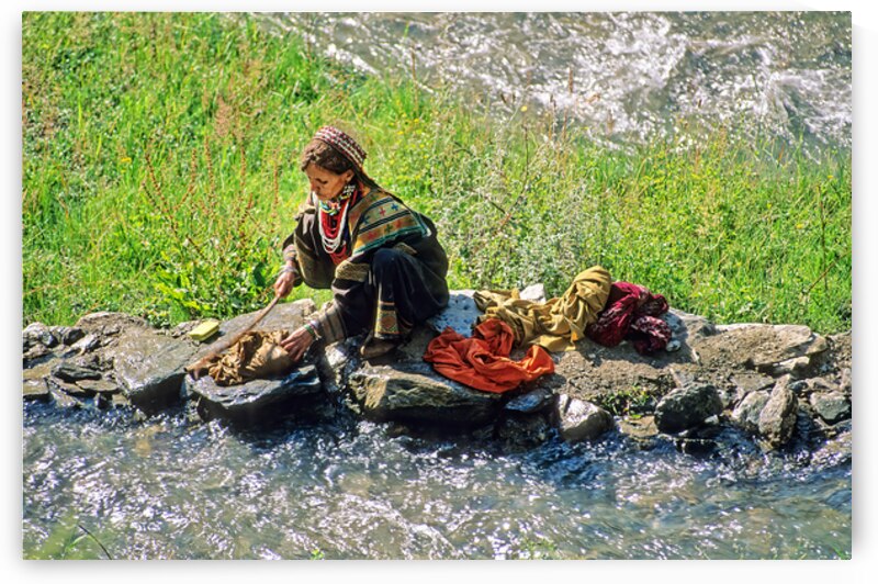 Life in Kalash Village in Bumburet Valley with river scene by Marco Brivio