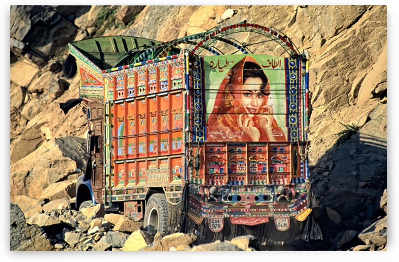 Trucks carrying goods to Shandur Pass in Pakistan by Marco Brivio