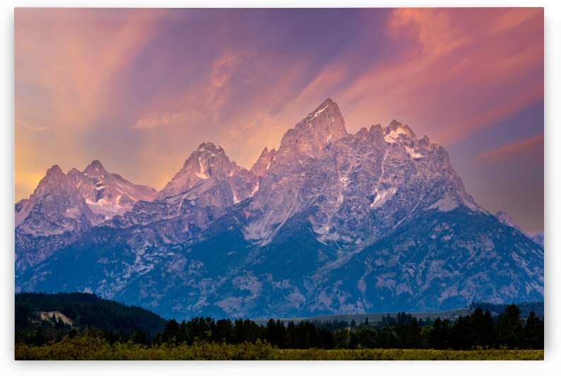 Peaks of Grand Teton National Park in evening light by Marco Brivio