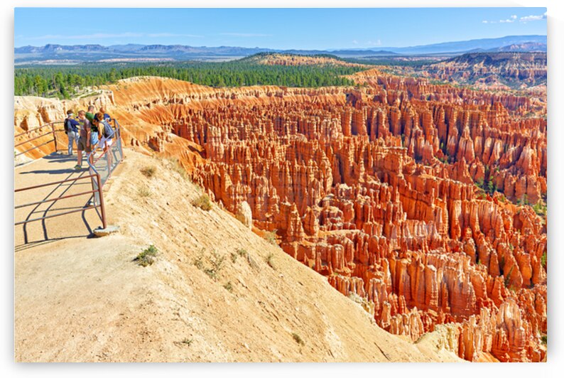 Visitors enjoy the view at Bryce Canyons Inspiration Point by Marco Brivio