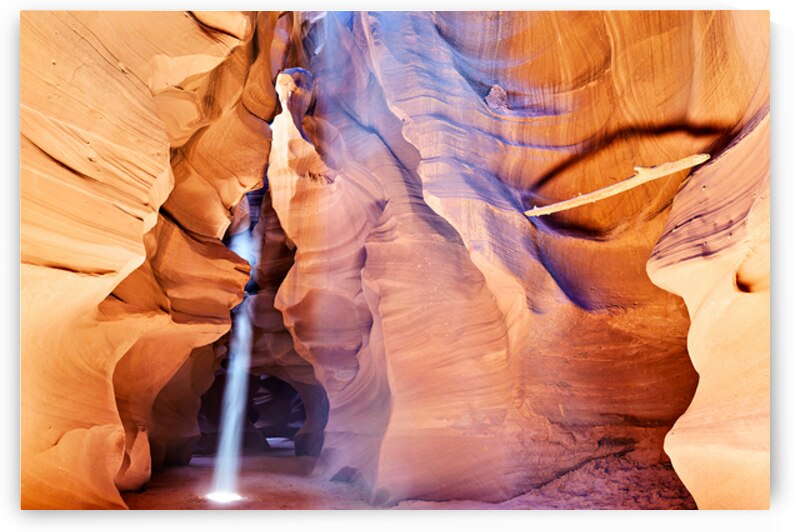 Exploring Antelope Slot Canyon with light beams shining down by Marco Brivio