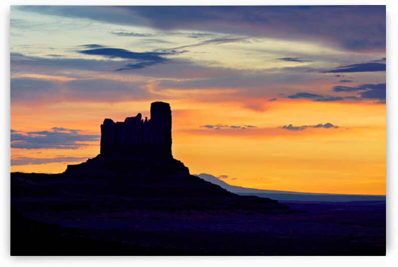 Sunset over monument valley in national park usa by Marco Brivio