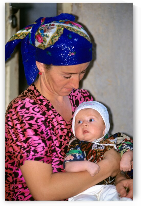 Mother and baby in Khiva Uzbekistan during daily life by Marco Brivio