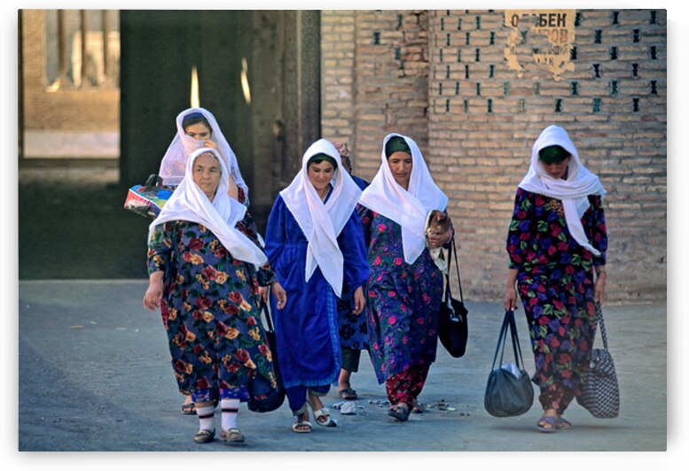Women stroll through Khivas streets with tradition by Marco Brivio