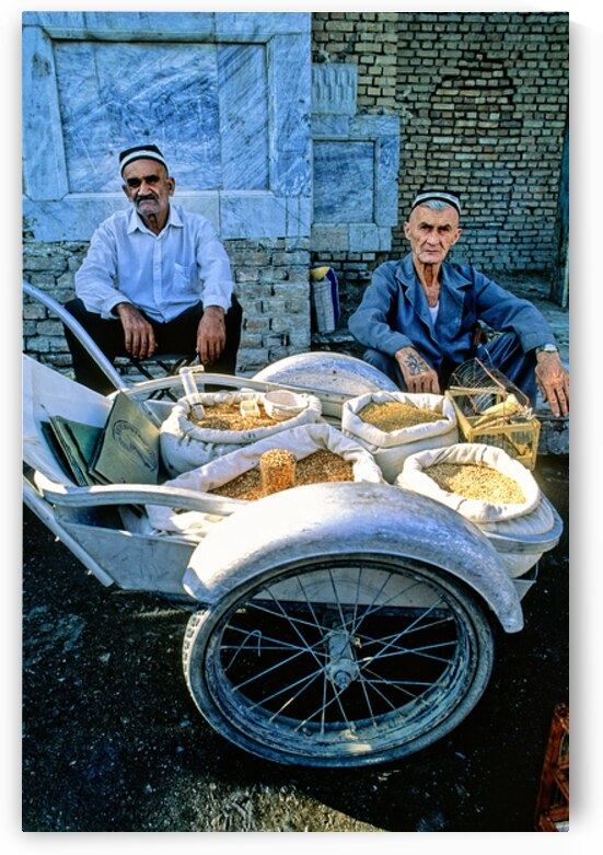Two men selling grains in Khiva Uzbekistan market by Marco Brivio