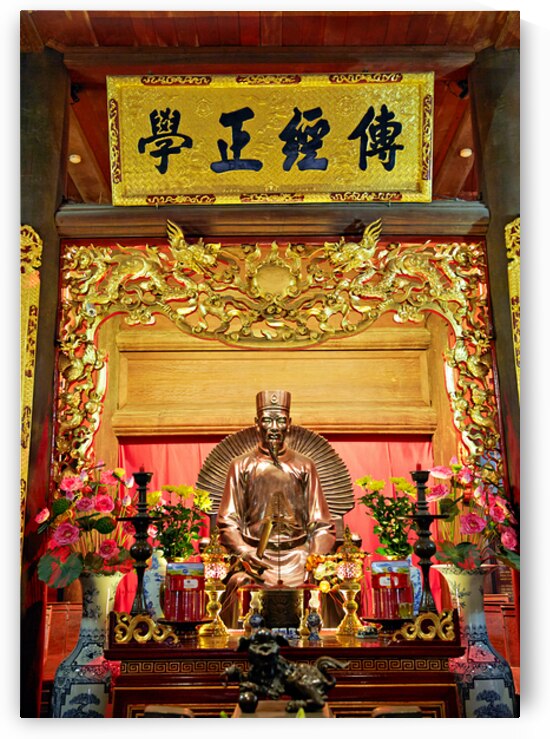 Statue and altar displayed in a temple in Hanoi Vietnam by Marco Brivio