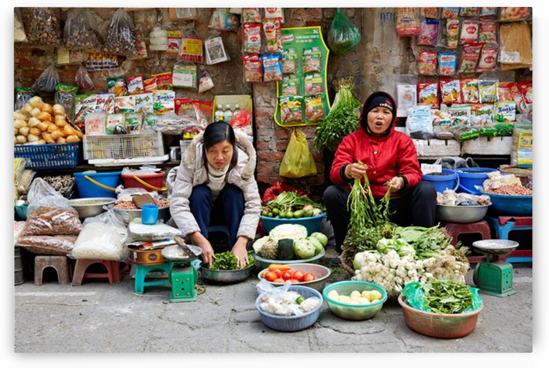 Women selling fresh vegetables in Hanoi market by Marco Brivio