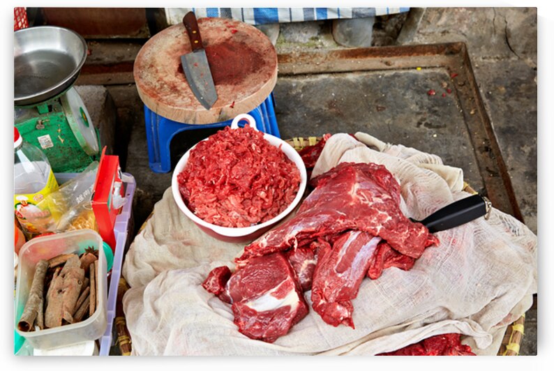 Meat preparation at a market in Ho Chi Minh City by Marco Brivio