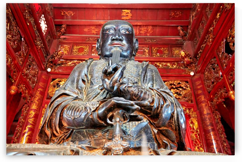 Statue of Buddha in Ho Chi Minh City temple area by Marco Brivio
