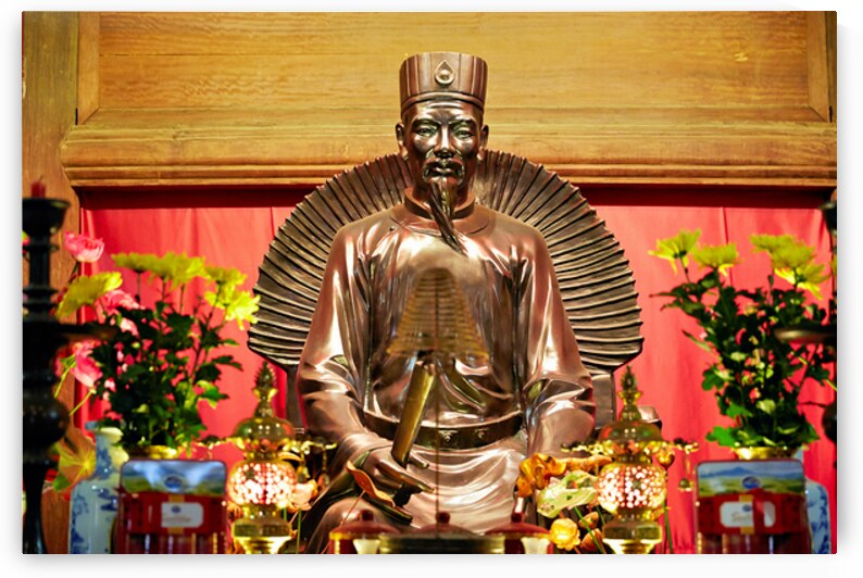 Statue in a Hanoi temple during a festival celebration by Marco Brivio