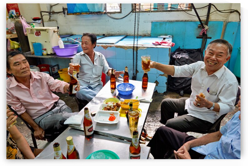 Local men enjoying drinks and food in Ho Chi Minh City by Marco Brivio
