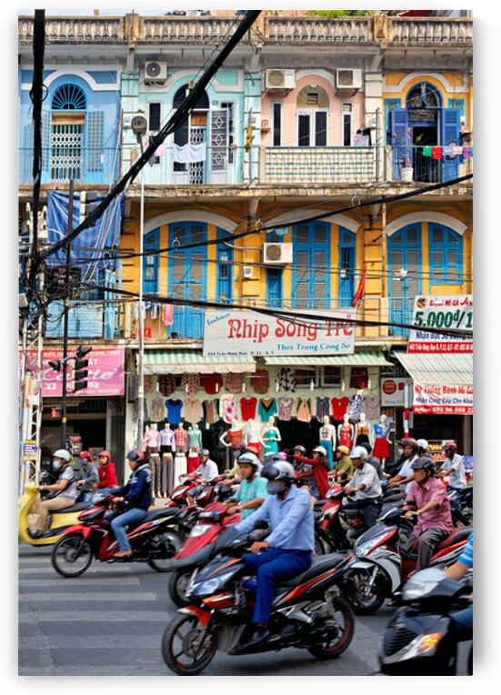 Traffic in Ho Chi Minh City with shops in the background by Marco Brivio