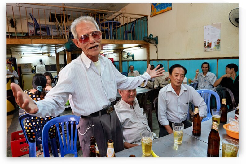 Men gather in Ho Chi Minh Vietnam for drinks and conversation by Marco Brivio