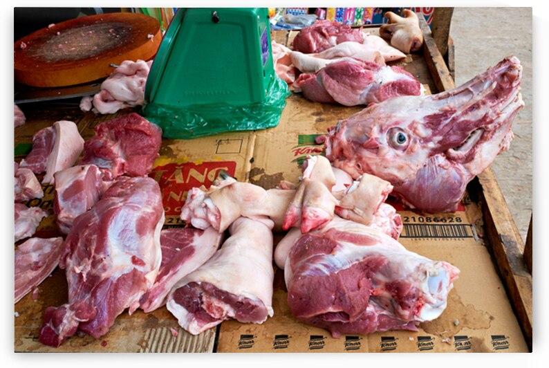 Meat displayed at a market in Phu Quoc Vietnam by Marco Brivio