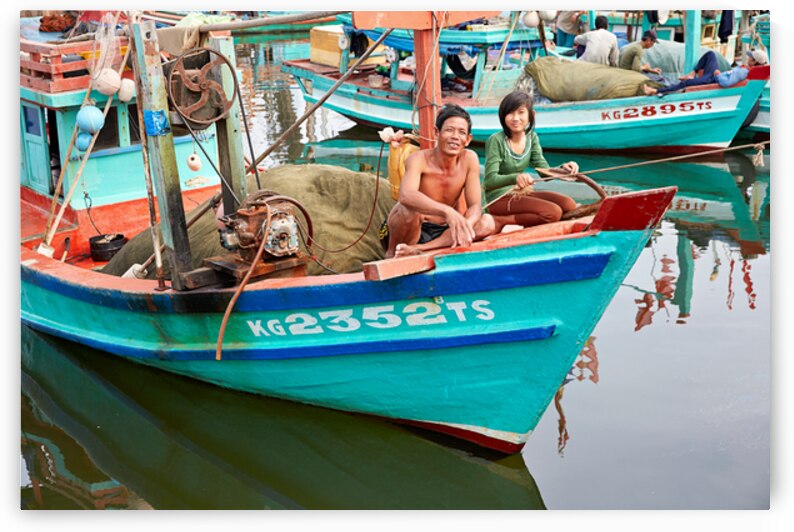 Fishing boats on Phu Quoc island in Vietnam with locals by Marco Brivio