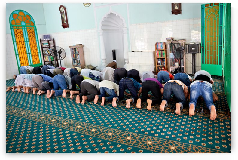 Men praying in a mosque in Ho Chi Minh City Vietnam by Marco Brivio