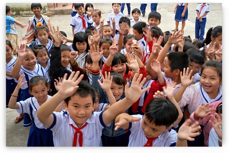 Students greet visitors in Phu Quoc Vietnam during school time by Marco Brivio