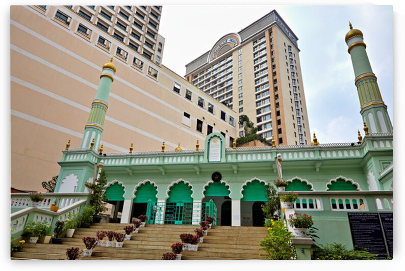 Historic mosque in Ho Chi Minh City near modern buildings by Marco Brivio