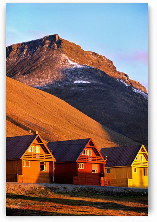 Colorful houses under a mountain in Longyearbyen Svalbard by Marco Brivio