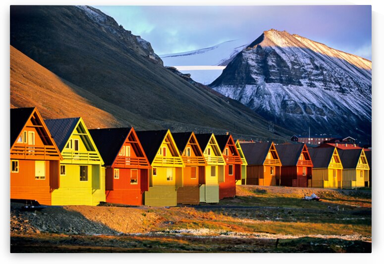 Colorful houses in Longyearbyen Svalbard during sunset by Marco Brivio