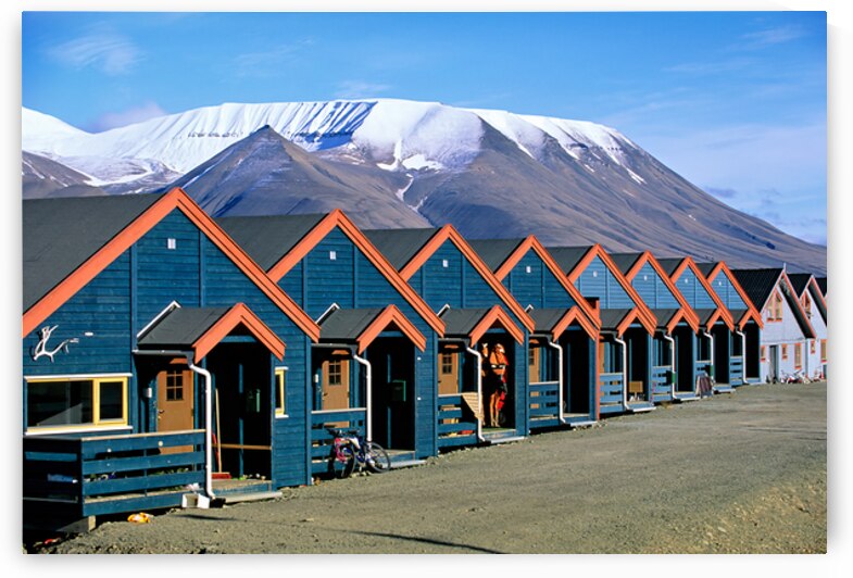 Colorful houses line the street in Longyearbyen Svalbard by Marco Brivio