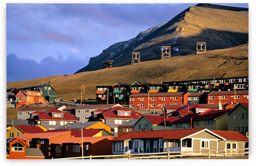 Colorful buildings in Longyearbyen Svalbard at sunset by Marco Brivio