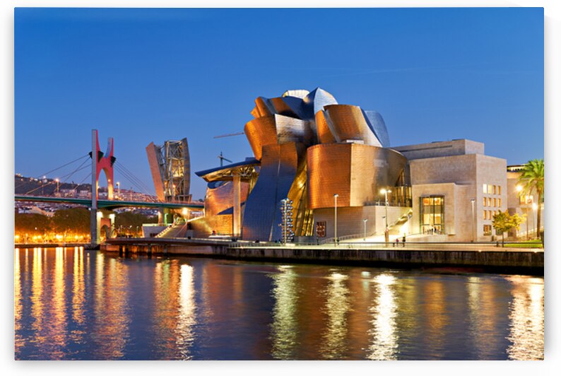 Guggenheim Museum in Bilbao at night with river view by Marco Brivio