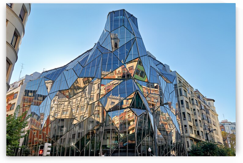 A modern building stands in Bilbao Spain by Marco Brivio