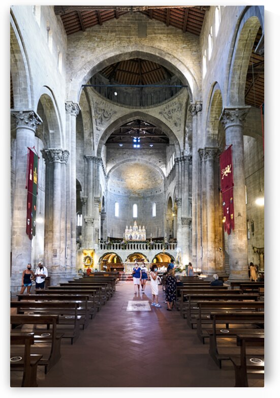 Visitors explore Santa Maria della Pieve in Arezzo Italy by Marco Brivio