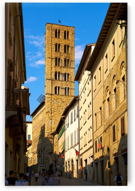 People walk along a street in Arezzo Tuscany Italy by Marco Brivio