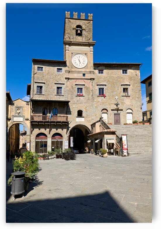 People visit Piazza della Repubblica in Cortona during sunny day by Marco Brivio