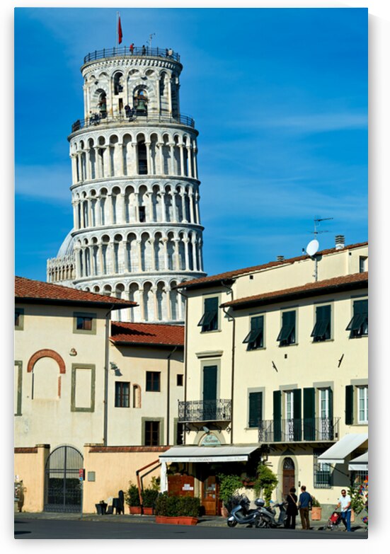 Leaning Tower of Pisa stands tall against a blue sky by Marco Brivio