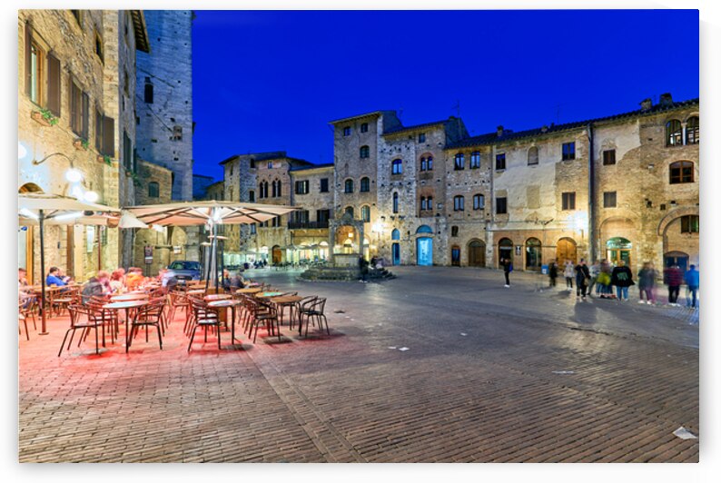 Visit San Gimignano at sunset in Tuscany Italy by Marco Brivio