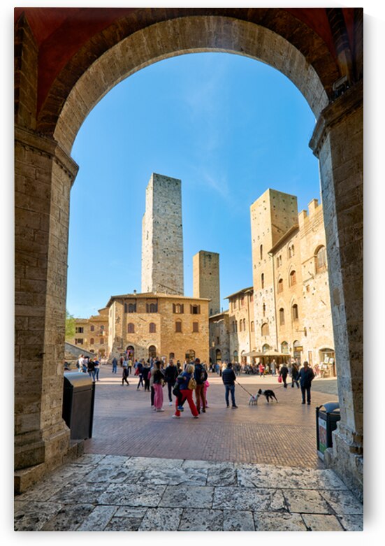 Visitors gather in San Gimignanos Piazza del Duomo in Tuscany by Marco Brivio