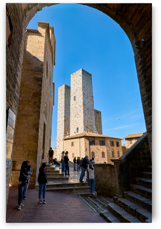Visitors enjoy Piazza del Duomo in San Gimignano Italy by Marco Brivio