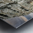 Serene stone faces adorn ancient Cambodian temple. Metal print