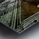 Ancient temple ruins with carved stone deity and moss. Metal print