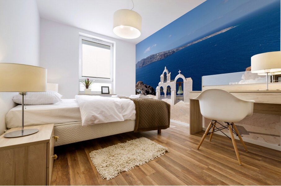 Iconic Santorini bell tower overlooking the caldera and Aegean S Mural print