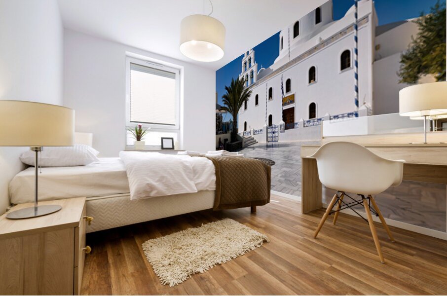 White Greek church with blue dome bell tower and marble courty Mural print