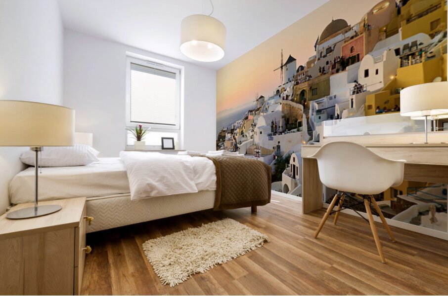 Whitewashed Santorini village and windmills at sunset over the s Mural print