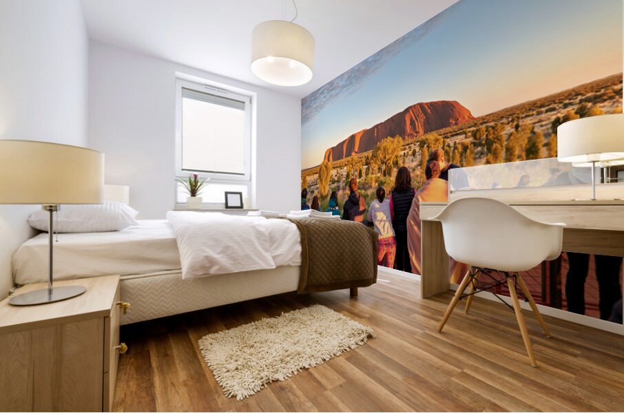 Tourists watch Uluru glow at sunrise. Mural print