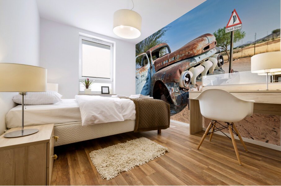 Classic car wreck in Namibias desert environment Mural print