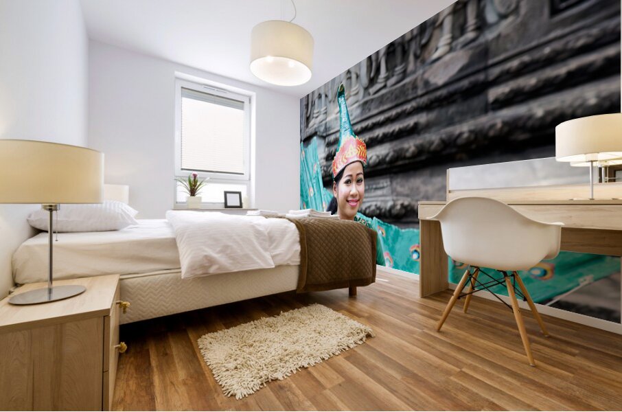 Smiling Cambodian dancer in traditional peacock costume at templ Mural print